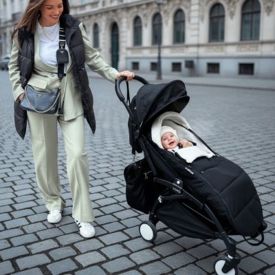 chanceliere-poussette-warmnest-noire-promenade-urbaine-chic