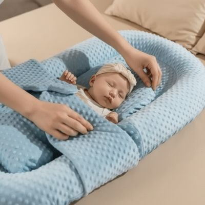 reducteur-de-lit-anti-sursaut-bleu-sommeil-profond