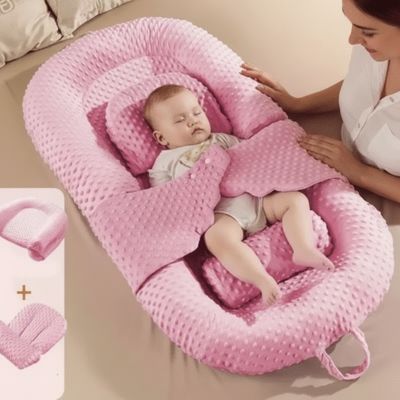 reducteur-de-lit-anti-sursaut-rose-maman-bebe