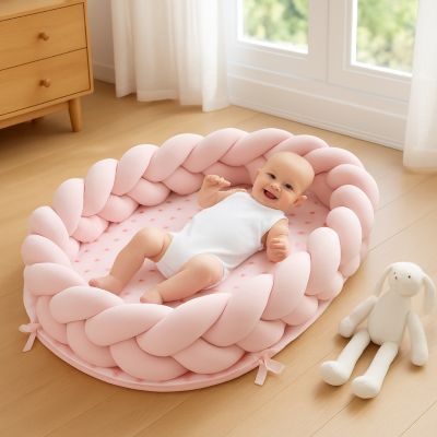 reducteur de lit bebe rose